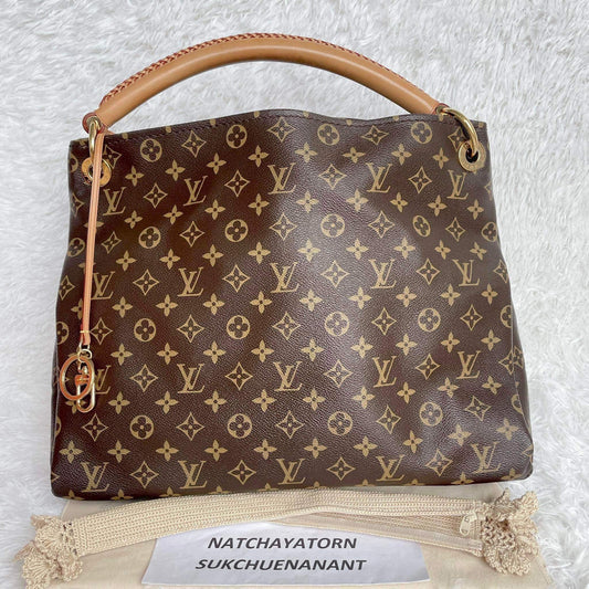 Artsy mm monogram in very very great condition with dust bag!!! (CA3190 date code)