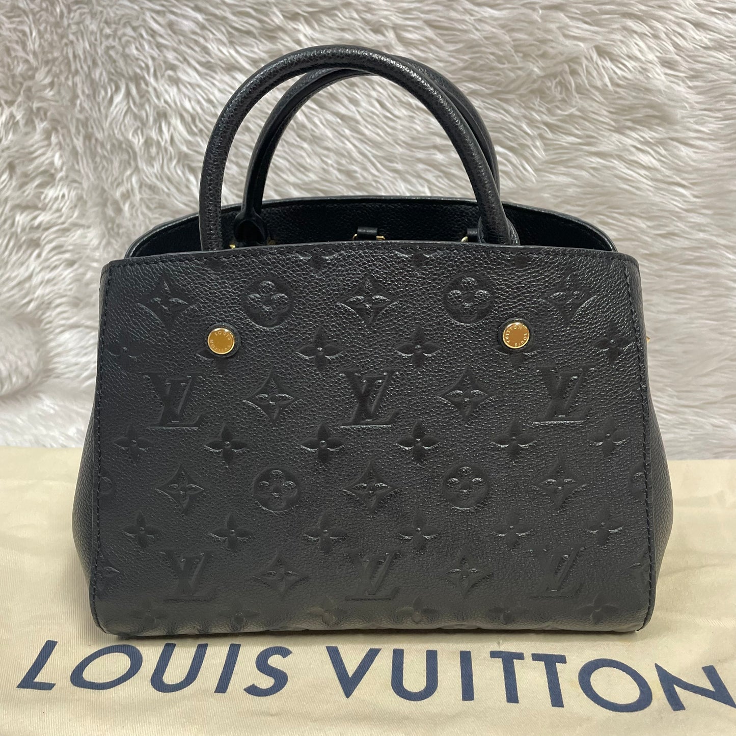 Authentic Montaigne bb noir empreinte black monogram in very excellent condition!!! (TR5106 date code) with dust bag (no key set) Payment plan available