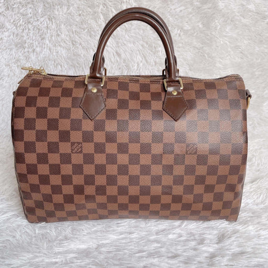 Speedy 35 bandouliere with dust bag and key set