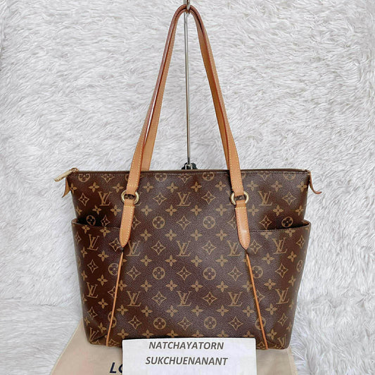 Totally mm monogram with dust bag