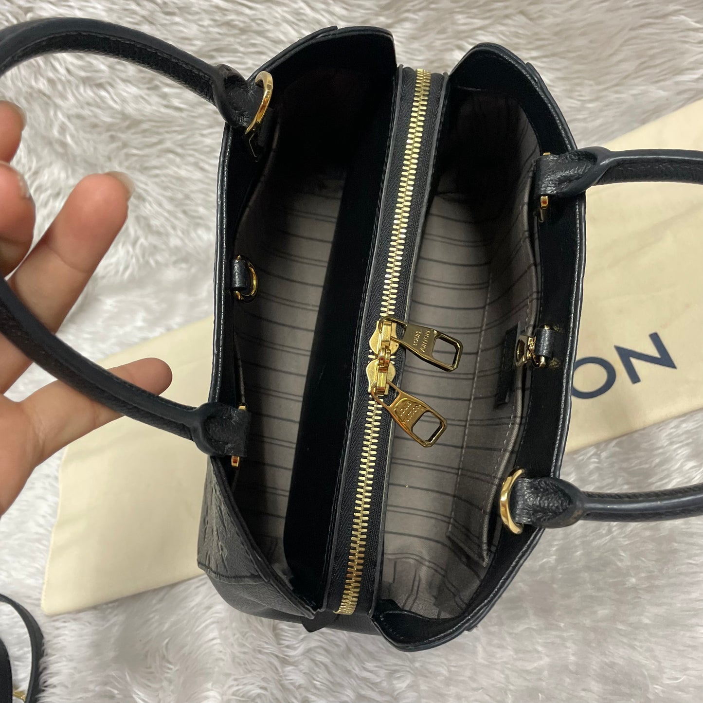 Authentic Montaigne bb noir empreinte black monogram in very excellent condition!!! (TR5106 date code) with dust bag (no key set) Payment plan available